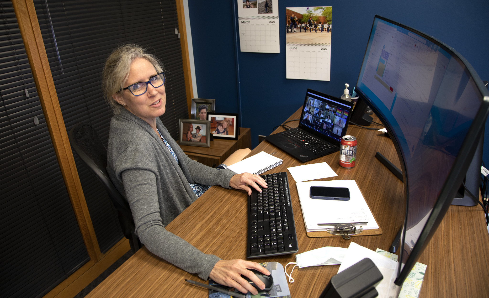 Amy Cohn sitting at desk on computer