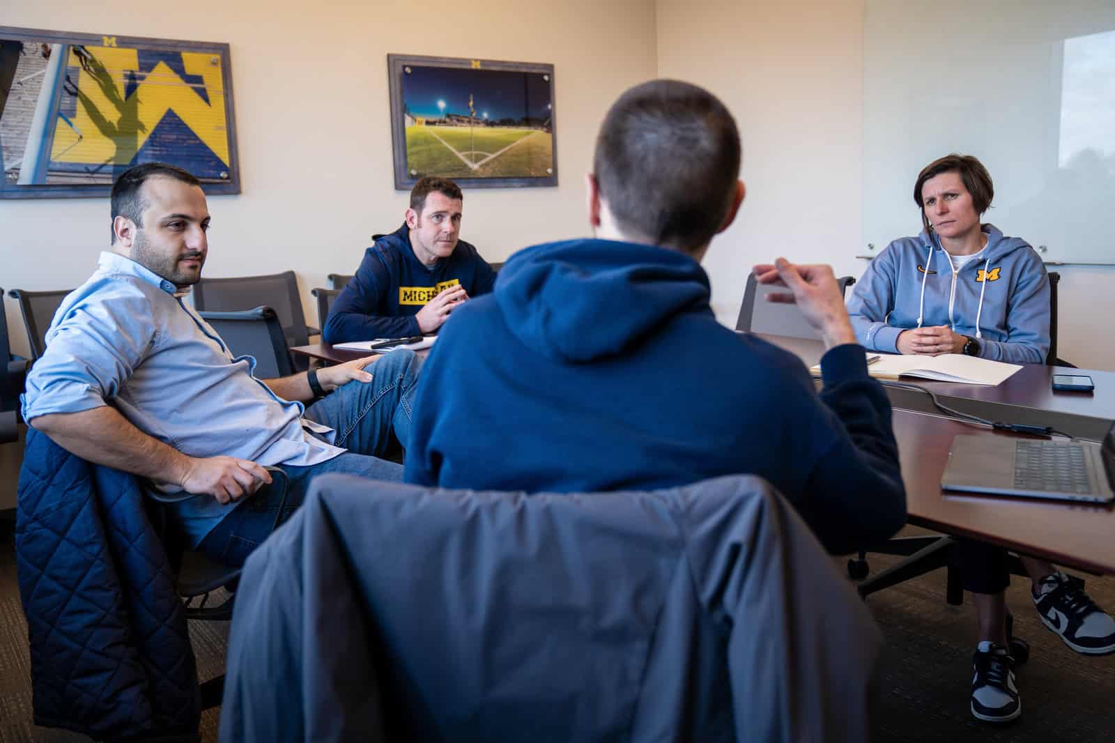 U-M IOE assistant professor Albert Berahas, associate professor Raed Al Kontar, U-M women’s soccer assistant coach Brian Dunleavy and head coach Jennifer Klein meet to talk about WinAi.