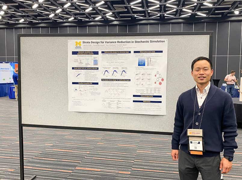 Alt-text: Jaeshin Park stands in front of a poster presenting the OptiTreeStrat research.
